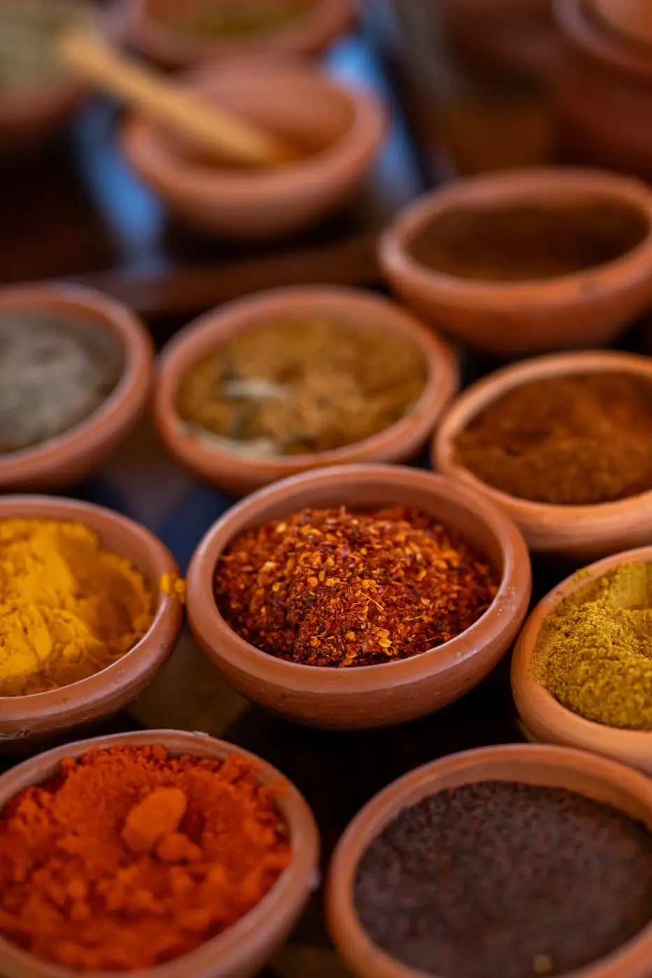 Clay bowls of ground spices